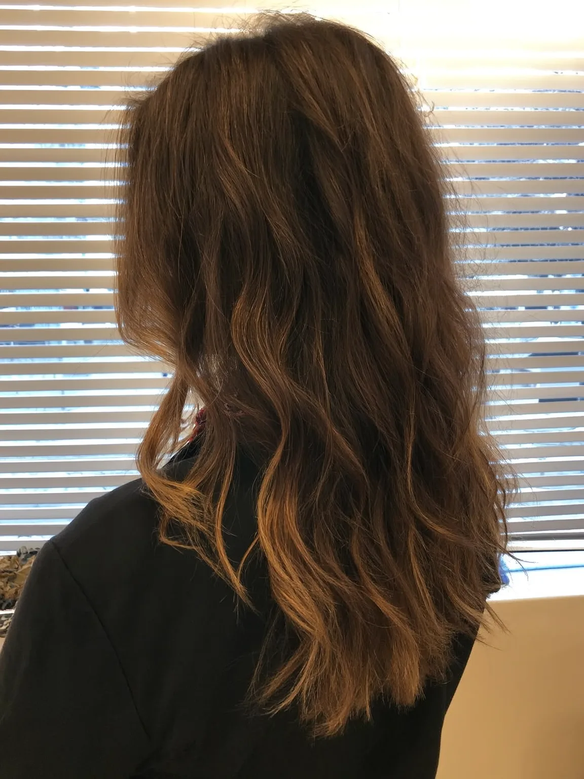 Long Wavy Layers in Warm Caramel Brown with No Bangs